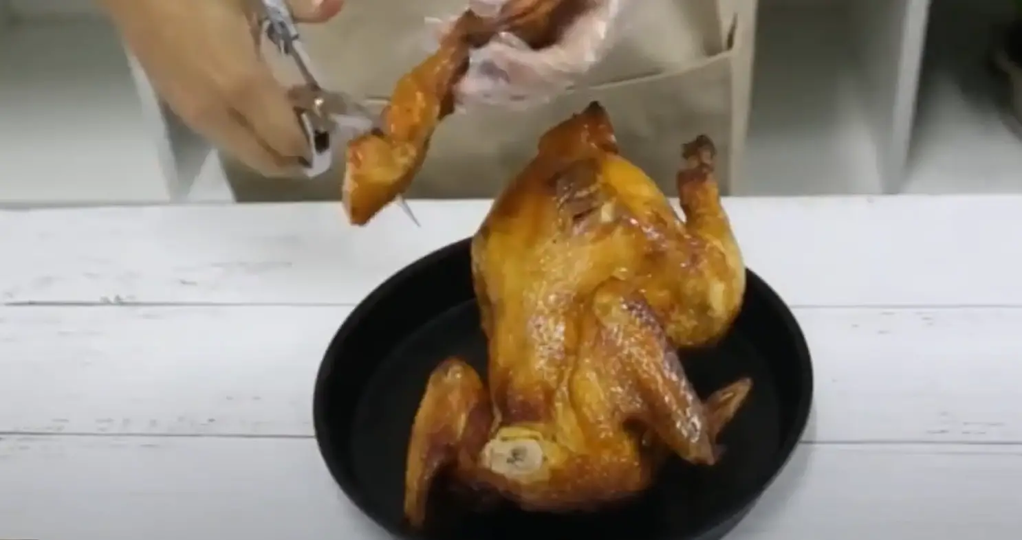 Cutting chicken meat