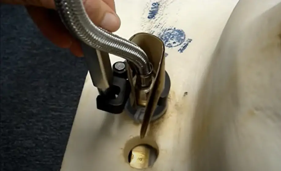 How do you tighten a faucet underneath