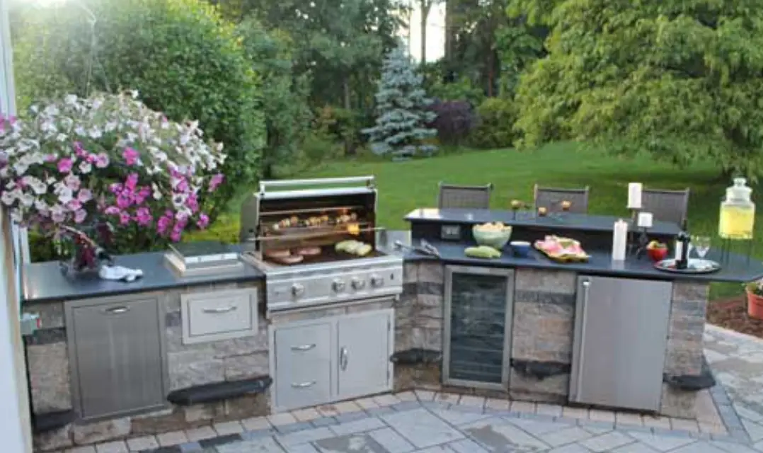 What appliances should I include in my outdoor kitchen