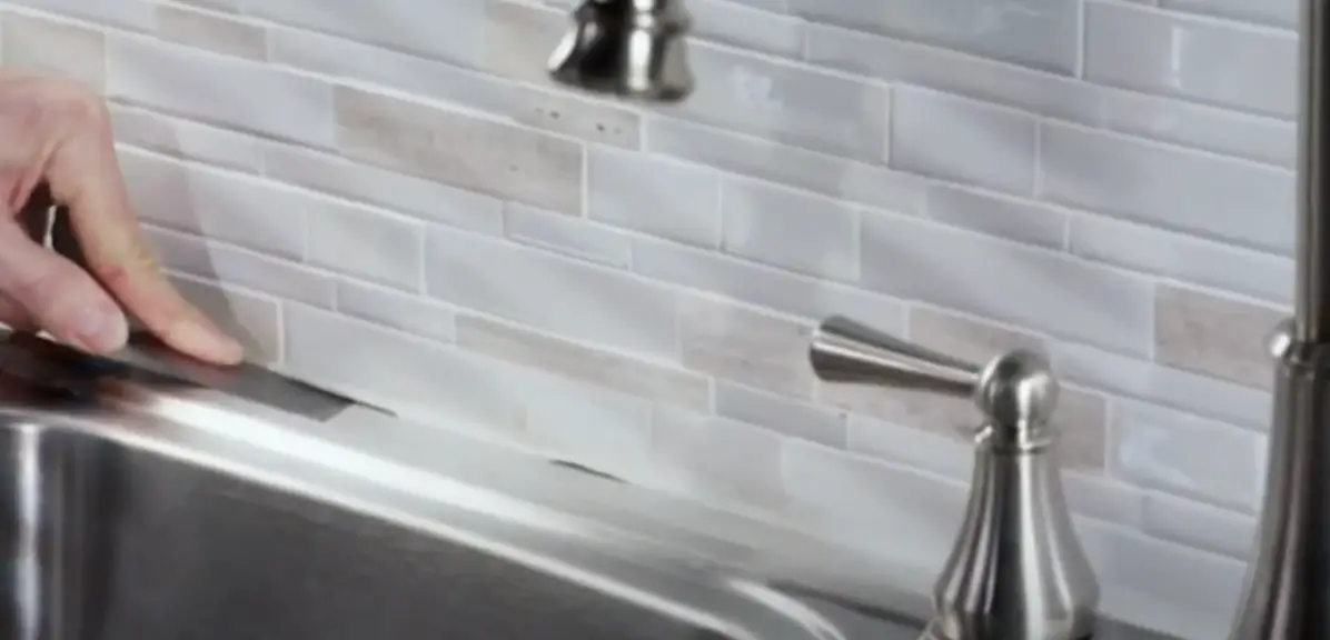 Why do you need to caulk a Kitchen Sink