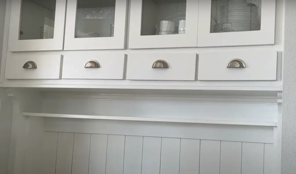 How do you move kitchen wall cabinets?
