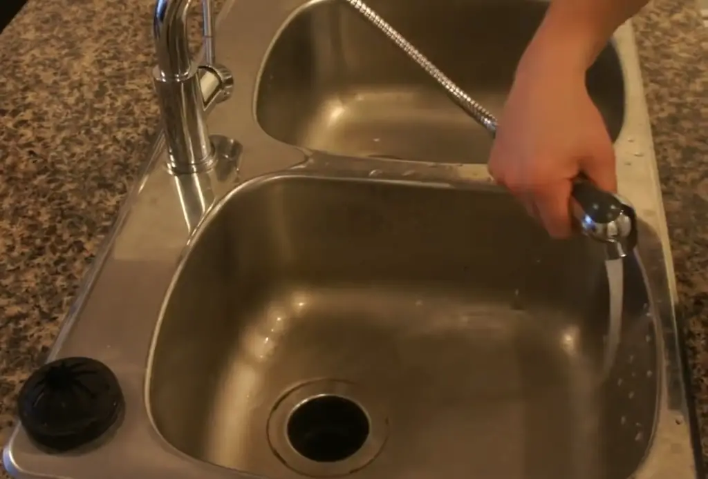 How to maintain a double kitchen sink to prevent clogging?
