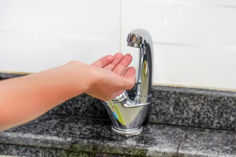 How do I make my touchless faucet work manually