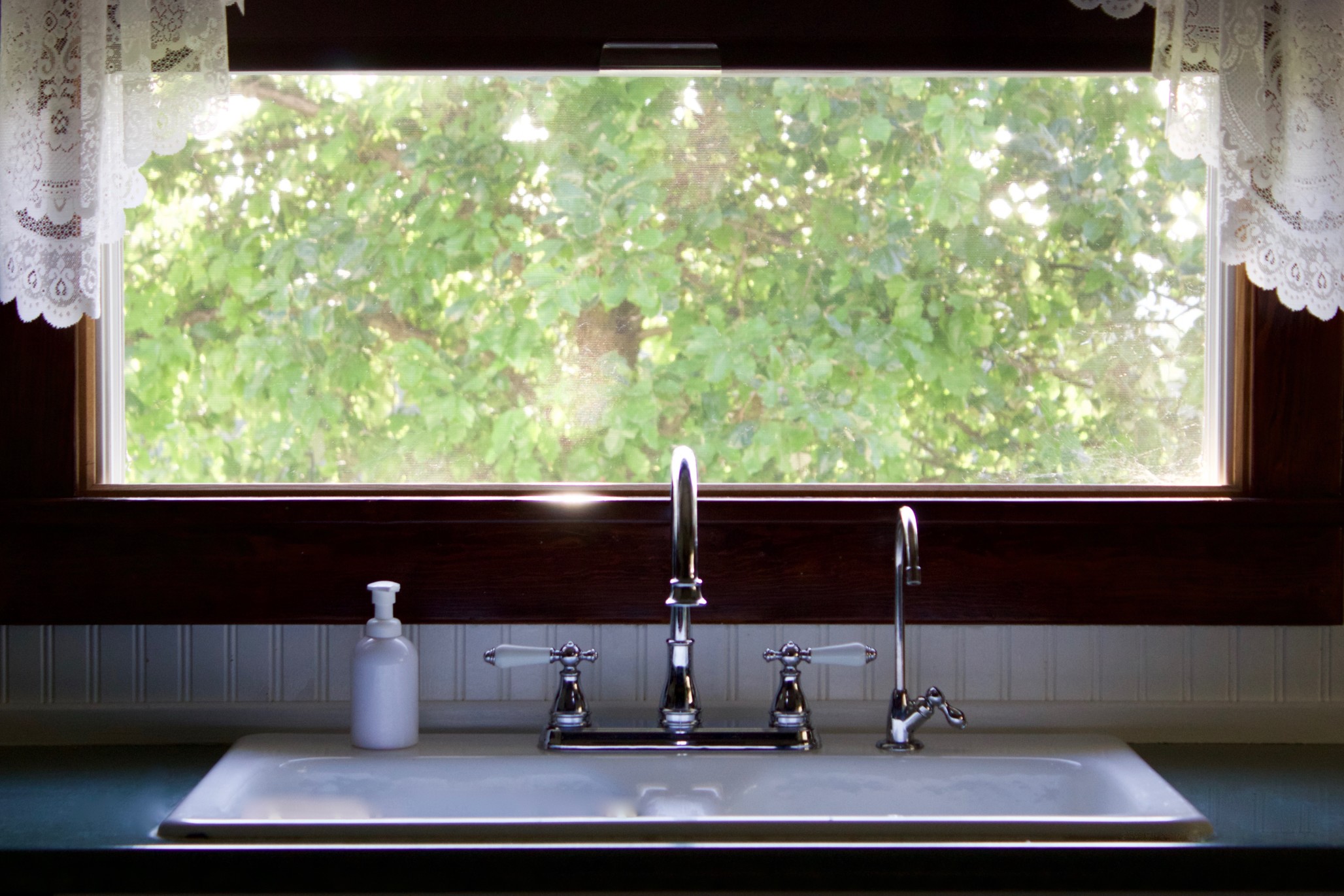 How do you cover an open kitchen window