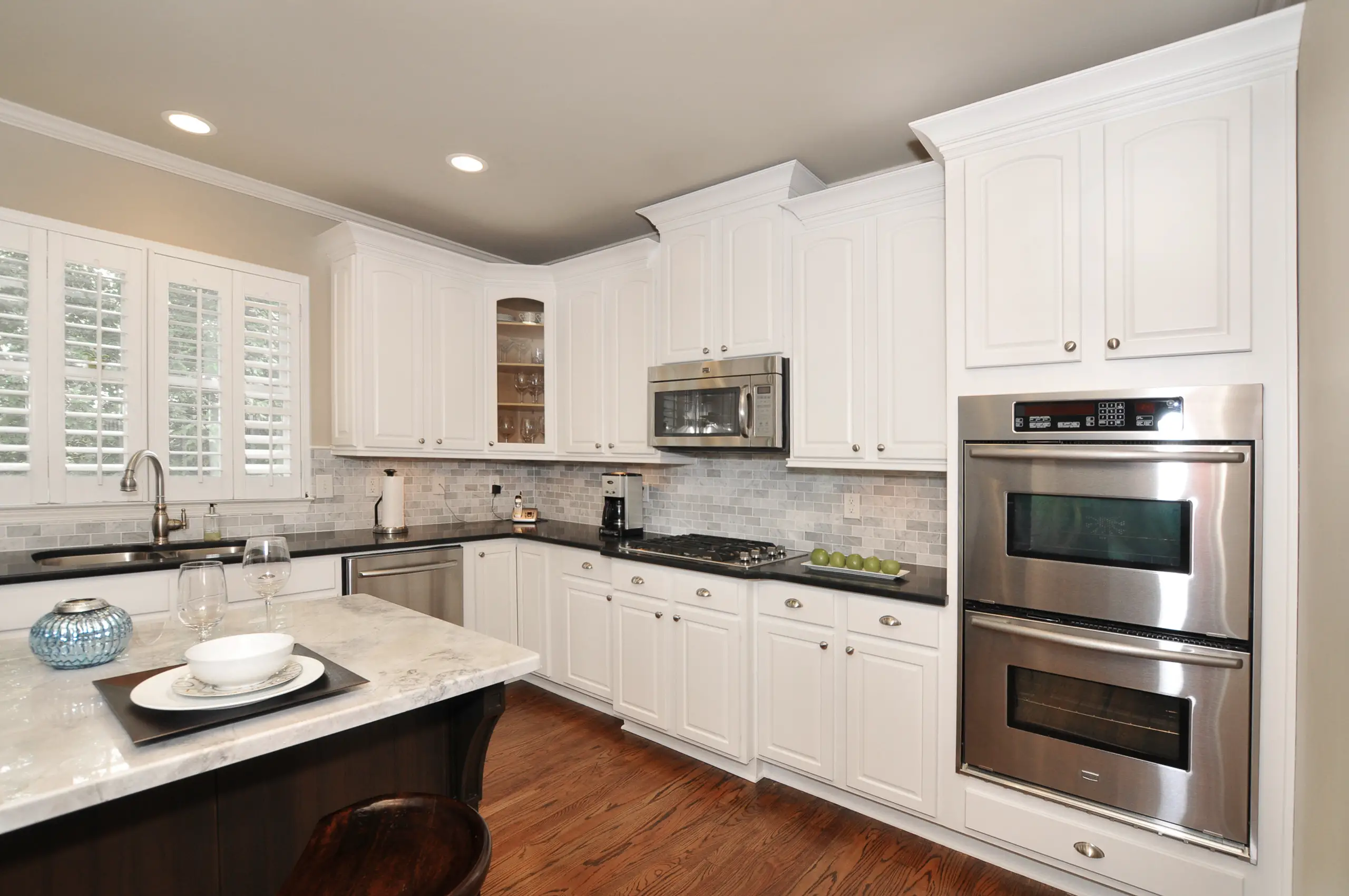 Off-White Kitchen cabinets With Crown Molding on Top