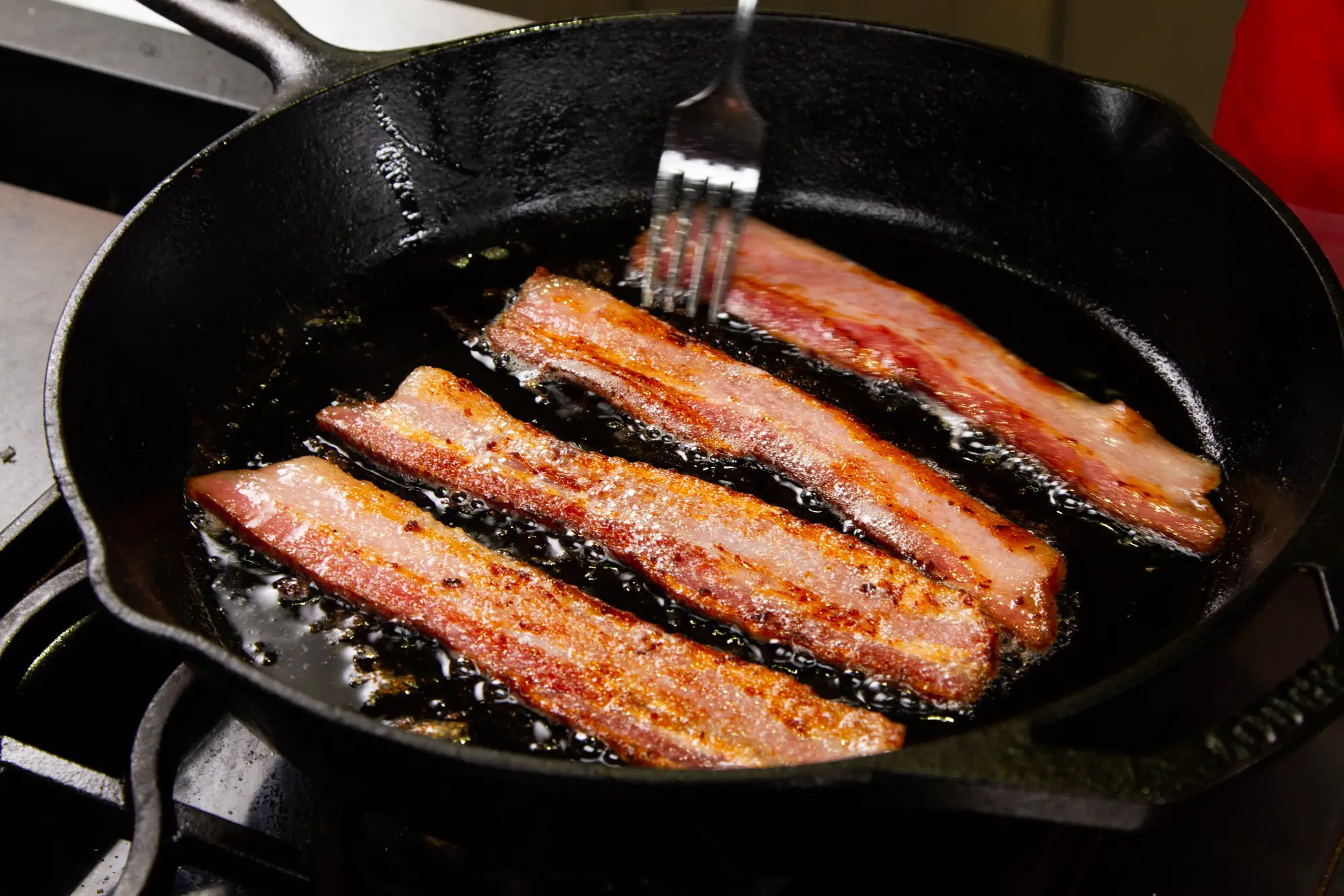 Fry Strips Of Bacon Straight
